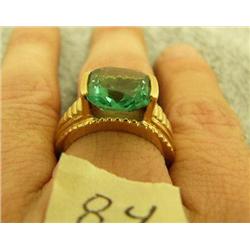 Gold ring with large green stone (3)