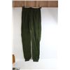Image 2 : (2) Boxes Woolpower Clothes - XXXL Green Pants, XXXL Black Shirt, Both Seemingly NIB