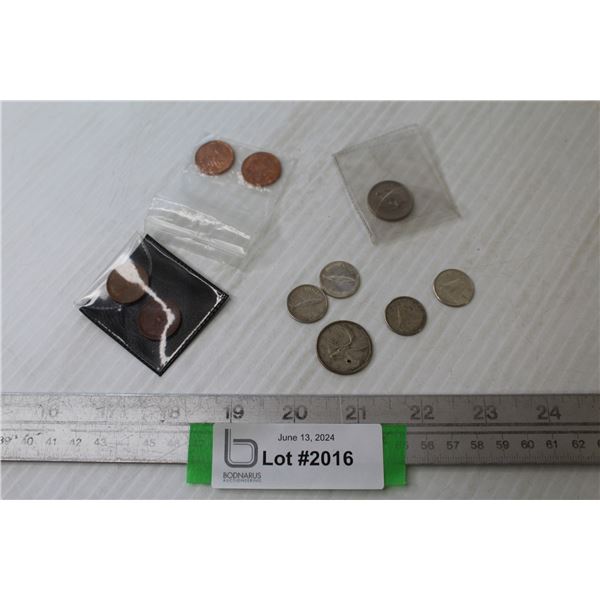 (1) 1967 Canadian Nickle - (2) 1992 Canadian Pennies - (2)1967 Canadian Pennies -(1) 1957 U.S. Quart