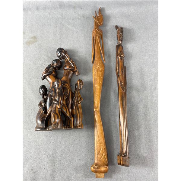 3 Vintage Wood Carvings African Figurines. Approx. 20 1/2" H & 25 1/2" H & Musician Family Approx. 1