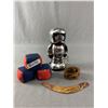 Image 1 : Klutz Juggling Bean Bag Cubes, Schylling Tin Wind-Up Storm Tropper, Leather Cuff & Mini Boomerang