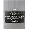 Image 1 : Press Board " Wine Improves With Age…" Sign. Approx. 13" x 22"