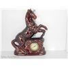 Image 1 : Brown horse clock - ceramic