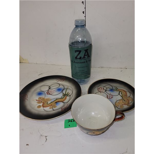Dragon tea cup with saucer (Geisha girl face on bottom of cup)