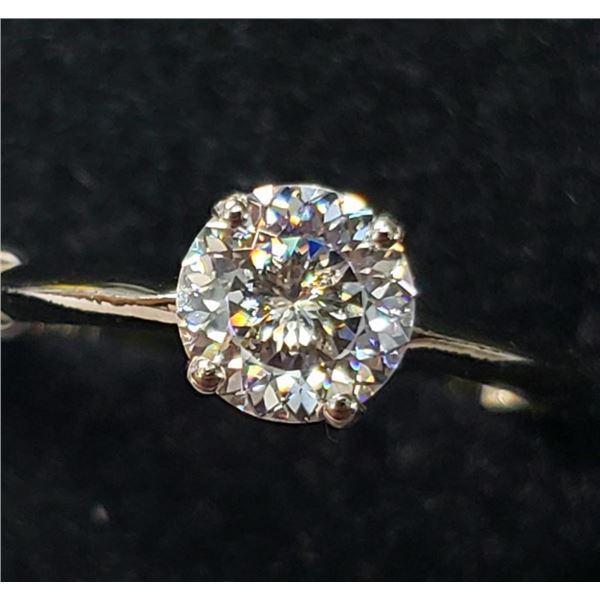 10K White Gold Moi(0.75ct) Ring (~Size 6.5)(Ring is resizable for $40) (~weight 1.13g), Made in Cana