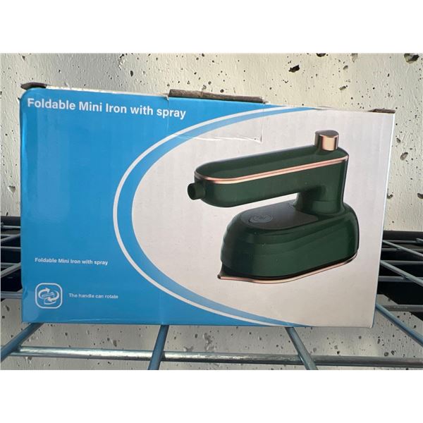 Foldable mini clothing iron with spray function