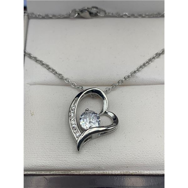 Floating Solitaire in Heart with bezel set stones Pendant & Chain