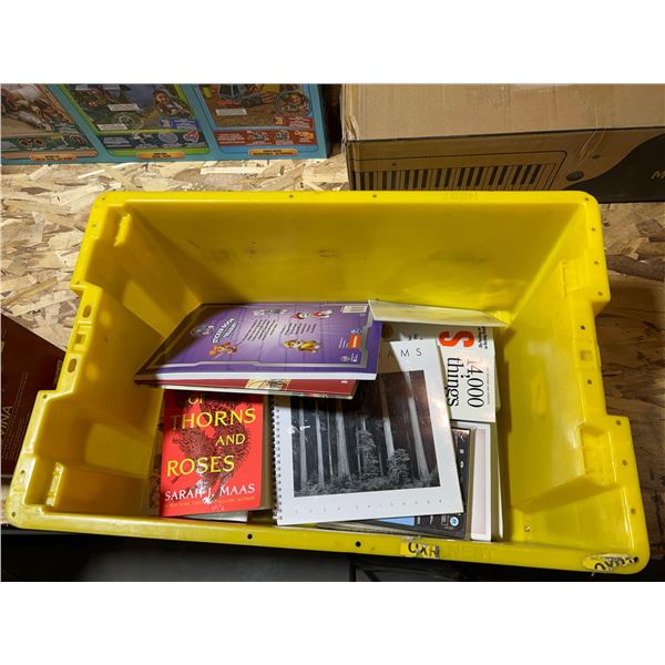 Bin of assorted books, bin included
