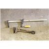Image 1 : Pipe wrench, rubber mallet, pipe wrench,