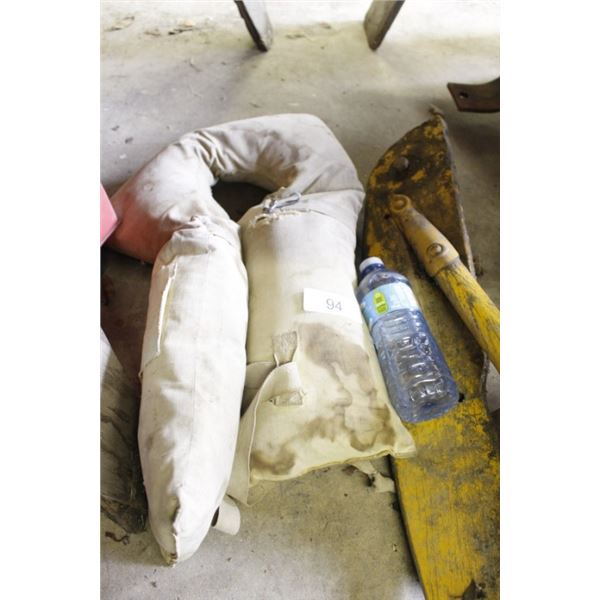 Vintage life jacket, boat rudder