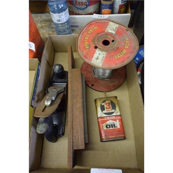 Wood plane, solder spool, sharpening stone,