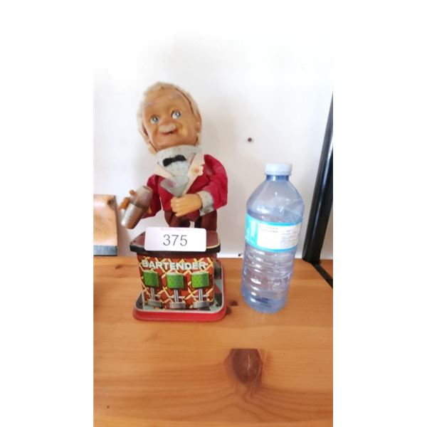 Antique bartender metal ornament