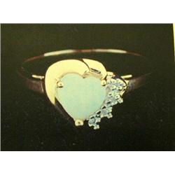 Opal and diamond lady's ring, 10K yellow gold, opal heart-shaped, cabochon, approx. .50 carats, clar