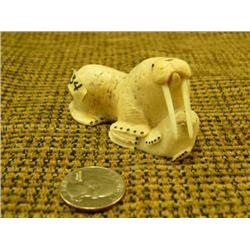 Bone walrus and calf with ivory tusks signed by Julienne Seppilu (33)