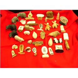 Lot of 37: various ivory and bone pieces - approx. retail value of lot $2505.00 (33)