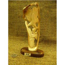 Mastodon ivory with two eagles fighting over fish on wood base - incredible detail- 8" tall Imported