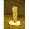 Image 1 : Bone intricate Native carving with face, bear, fish and eagle on ivory base 5" tall by Richard Mille