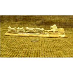 Bone dog team with ivory man and sled 9" long on wood base Imported (33)