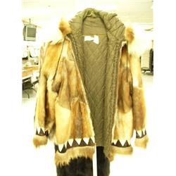 Muskrat coat with wolverine and polar bear fur ruff, with elaborate black and white fur embellishmen