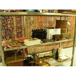 Entire shelf: small oriental rug, old prints, type writer, flat wear, carved wood box, old wood coff