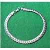 Image 1 : 13)  SILVER TONE FLAT 8.5" HERRING BONE BRACELET.