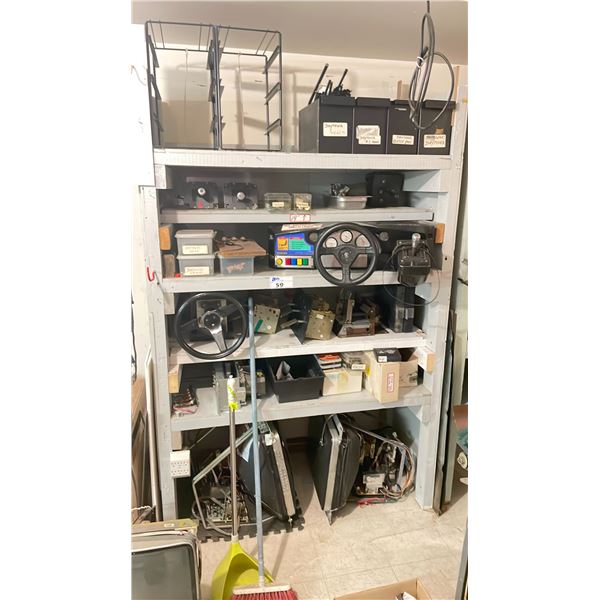 SHELF OF ASSORTED DRIVER STYLE ARCADE MACHINE PARTS