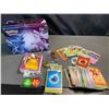 Lot of 1 Pokemon Storage Tin with Assorted Authentic Pokemon Cards, Mini Binder, Playing Dice, etc.