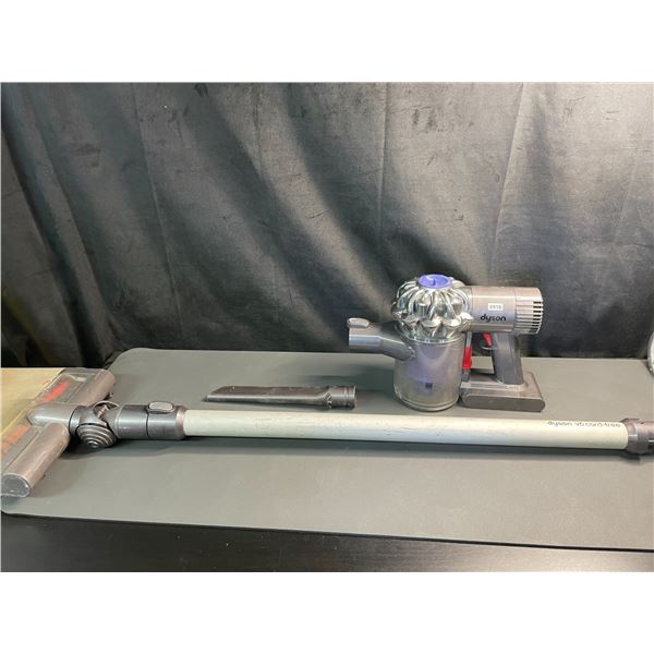 Lot of 1 Dyson Vacuum w/ Battery & Long Hose/Cleaning Piece - Used
