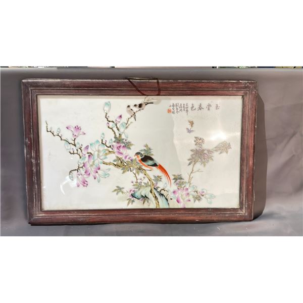 A FAMILLE ROSE BIRD GARDEN FRAMED TILE APPROX 16" HIGH X 25" LONG