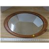 Image 1 : Oval shaped mirror in brown wooden frame- 24"X15"