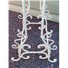 Image 6 : Ornate metal nesting plant stands.