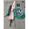 Image 1 : Outdoor summer lot. Umbrella, rack & hose, netting & plant rings.