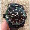 Image 1 : Citizen Eco-Drive golf watch. Black/green stainless steel case, black polyurethane strap.  Luminous 