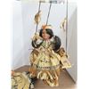 Image 2 : Lot of 2 native American porcelain dolls on swings
