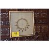 Image 2 : FRAMED BOAR'S TOOTH NECKLACE (15 1/4" X 15 1/4")