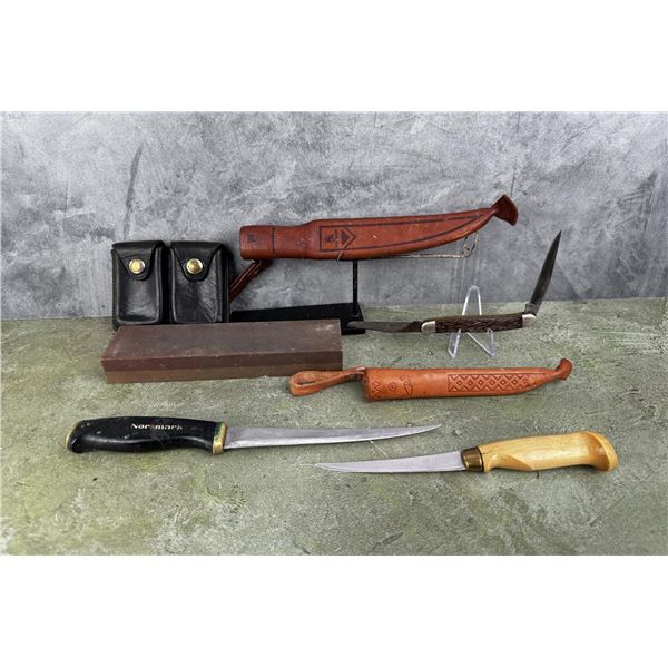 Collection of Fishing Knives and Stone