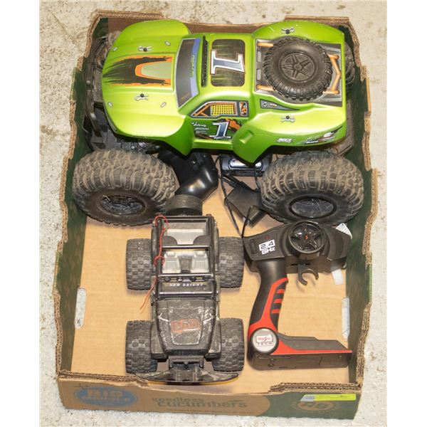 FLAT WITH TWO RC TRUCKS WITH CONTROLLERS