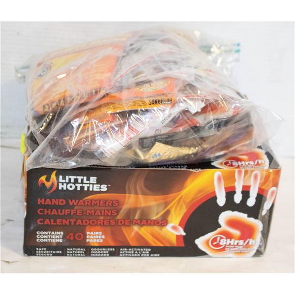 1 BOX AND 1 BAG FULL OF HAND WARMERS