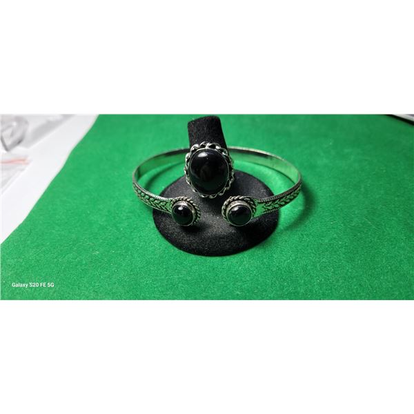 13)  SET OF BLACK ONYX  SIZE 6 RING AND CARVED OPE