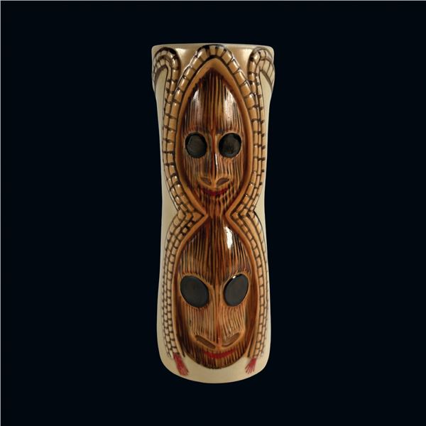 SPANISH KON-ID MUG INSPIRED BY NEW HEBRIDES CARVING IN SOUTH PACIFIC BOOK.