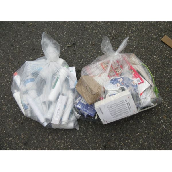 2 Clear Grab Bags of Assorted Overstock Goods