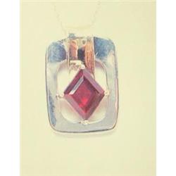 Garnet pendant and chain, 14K yellow and white gold, garnet diamond shaped and faceted, approx. 1 ca