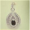 Image 1 : Sapphire and diamond pendant and chain 14K white gold, sapphire oval, faceted, approx. .50 carats, s
