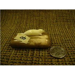 1.5" white ivory seal mounted on 2.5" fossilized ivory base (148)