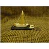 Image 3 : 2" ivory Eskimo sail boat with fossilized ivory seal and rudder with seal gut sail mounted on baleen