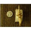 Image 4 : 2.5" fossilized ivory kayaker with seal by Thomas Pushruk from king island in 2005