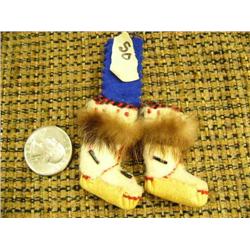 Wonderful pair of mukluks 1.5" long beaded and sewn (2)