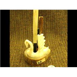 Ivory bird by Aningayou 3" tall mounted on old whale bone, baleen ivory and bone backdrop - stock #4