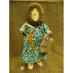 Chevak doll by Roselyn Paniyak - stretching muskrat