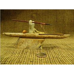 8"soapstone kayaker mounted on whale bone with harpoon (2)